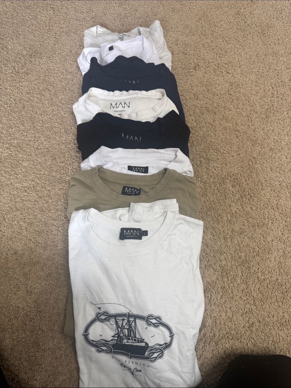 Bundle of 8 t-shirts size L short sleeve assorted colors. Good condition.